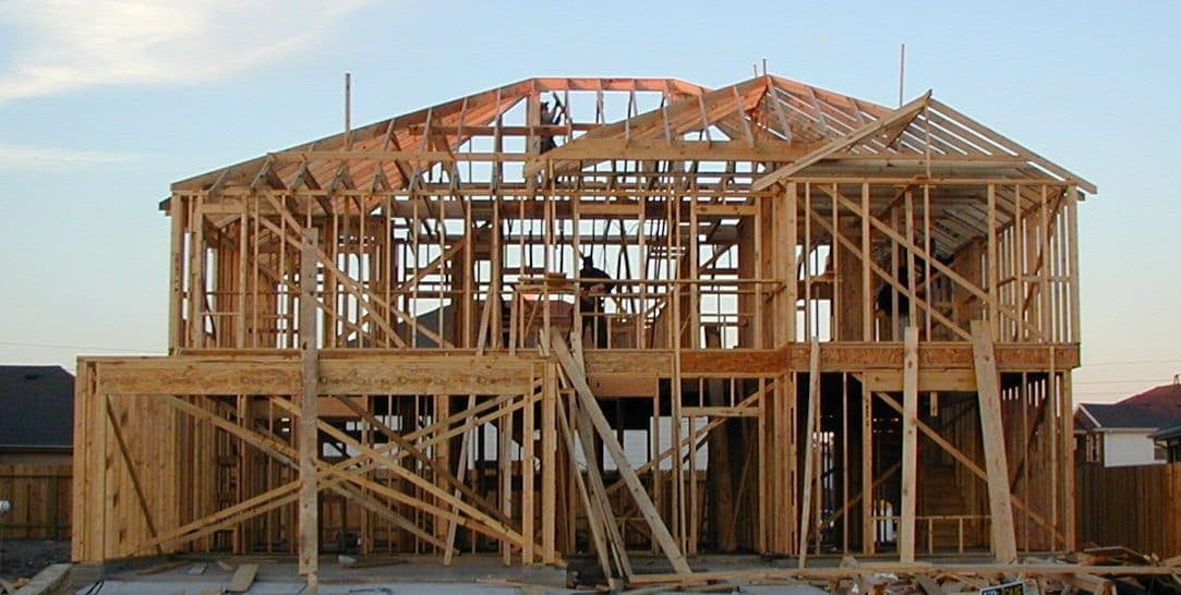 A new home under construction, timber frame in progress